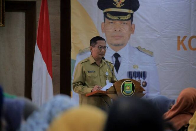 
 Sekretaris Daerah (Sekda) Kota Tangerang, Herman Suwarman saat buka Rempug Stunting Kota Tangerang. Foto: ist