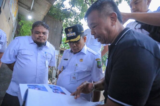 
 Pj. Wali Kota Tangerang Nurdin saat meninjau Sistem Pengendali Banjir di Kelurahan Uwung Jaya Cibodas. Foto: HumasPro 