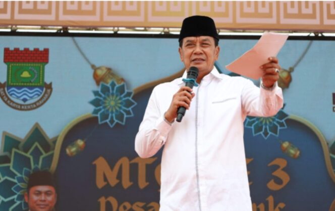 
 Bupati Tangerang, Moch. Maesyal Rasyid saat membuka Musabaqah Tilawatil Qur’an (MTQ) ke-3 tingkat Desa Blukbuk, Kecamatan Kronjo, Kabupaten Tangerang. Foto: ist