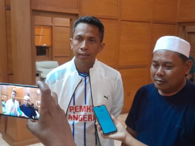 
 Kepala Pelaksana BPBD Kota Tangerang,H. Mahdiar dan Ketua FPRB Kota Tangerang, H.Supiani. Foto: JB